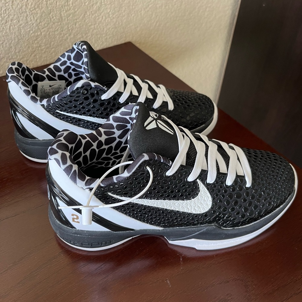 Nikes with Kobe and Gigi’s name on the back